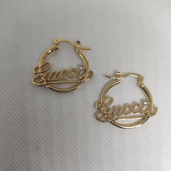 The Unbranded Brand Jewelry - Fashion Gold Logo Hoop Earrings